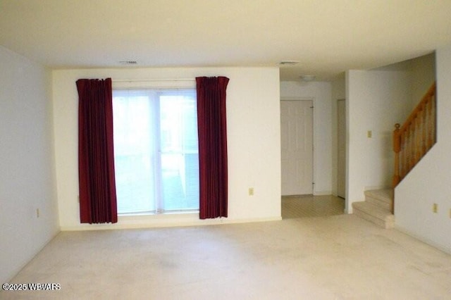 view of carpeted spare room