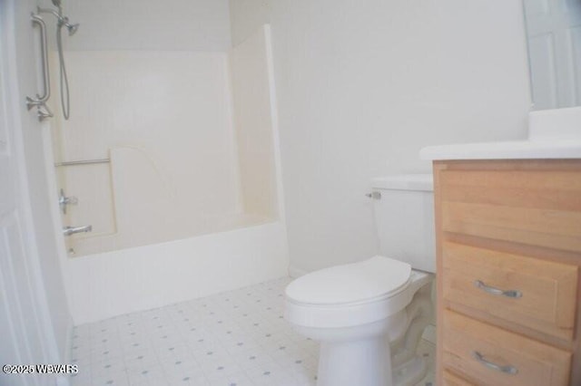 full bathroom with vanity, bathtub / shower combination, and toilet