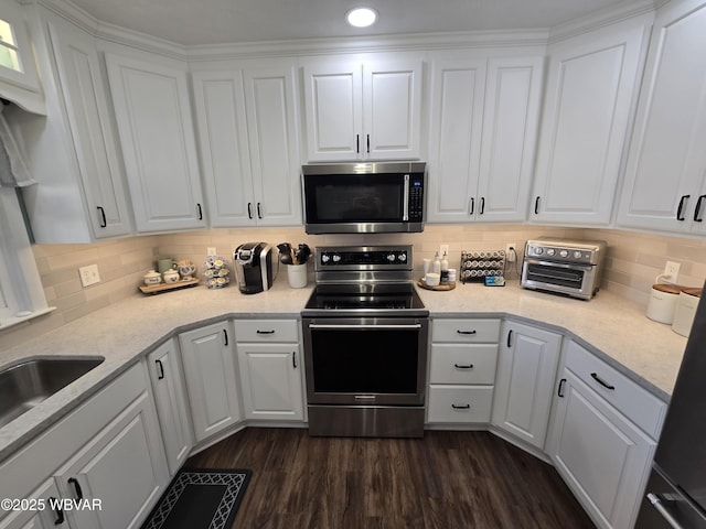 kitchen with white cabinets and stainless steel appliances