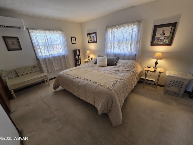 bedroom with an AC wall unit, baseboards, and carpet floors