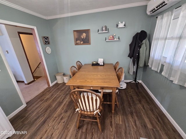 dining space with a wall unit AC, baseboards, dark wood-style flooring, and ornamental molding