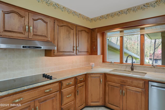 316 Winter St, Duboistown, PA 17702 - kitchen featuring under cabinet range hood, dishwasher, a sink, black electric stovetop, and tasteful backsplash