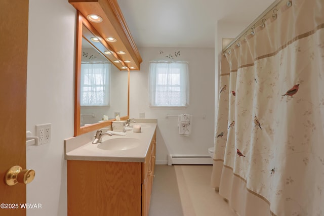 316 Winter St, Duboistown, PA 17702 - bathroom featuring recessed lighting, toilet, vanity, a shower with curtain, and a baseboard radiator