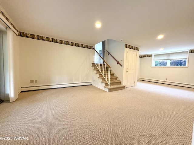316 Winter St, Duboistown, PA 17702 - below grade area with a baseboard radiator, stairway, carpet flooring, and recessed lighting