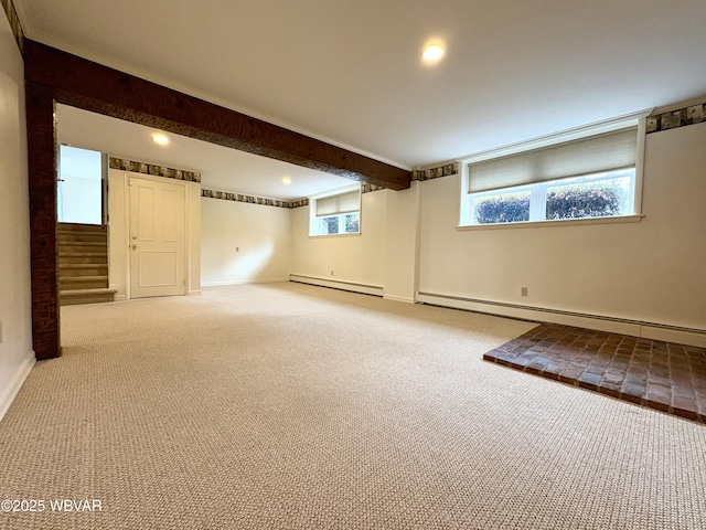 316 Winter St, Duboistown, PA 17702 - basement with plenty of natural light, baseboards, carpet floors, and a baseboard radiator