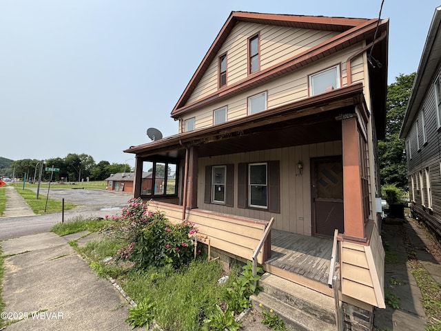 877-879 S 2nd St, Sunbury, PA 17801 - view of front of home with covered porch