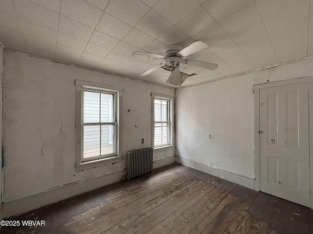 877-879 S 2nd St, Sunbury, PA 17801 - empty room with radiator, hardwood / wood-style floors, and a ceiling fan