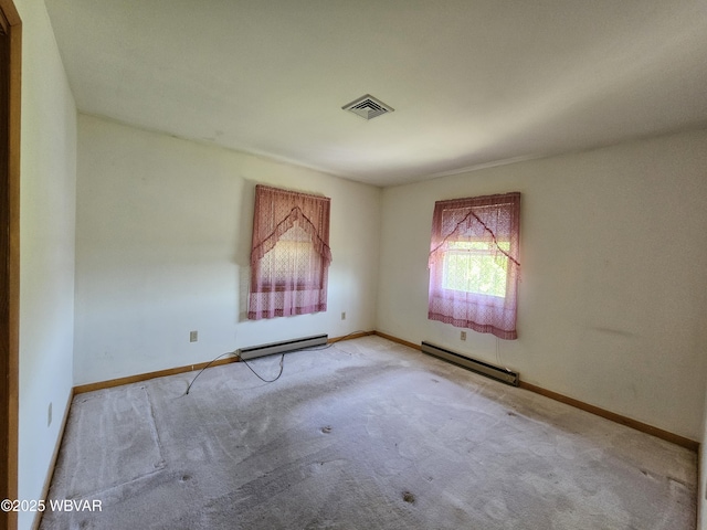 399 Sholder Rd, Williamsport, PA 17701 - carpeted empty room featuring a baseboard heating unit and baseboards