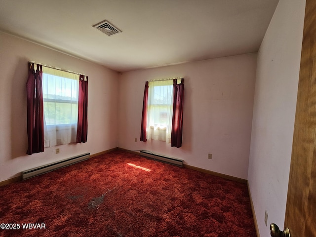 399 Sholder Rd, Williamsport, PA 17701 - carpeted empty room featuring a baseboard heating unit and healthy amount of natural light