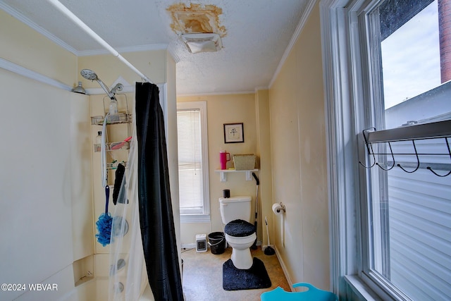 interior space featuring shower / bath combination with curtain, a textured ceiling, toilet, and ornamental molding