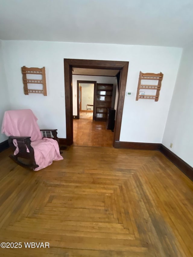 hall with parquet flooring