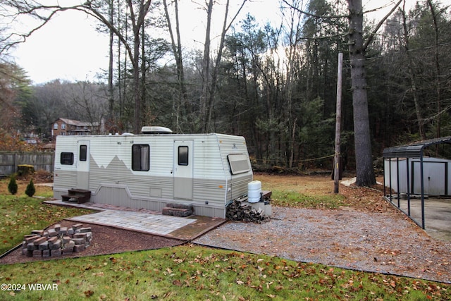 exterior space featuring a shed