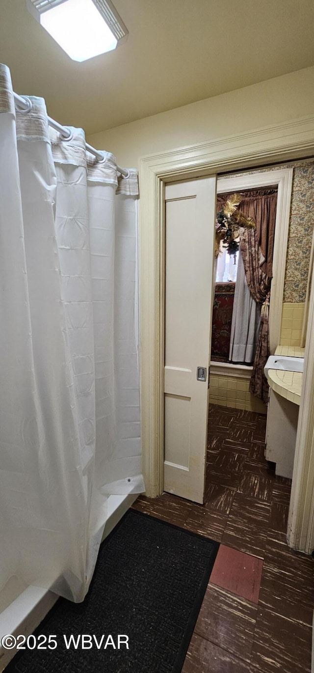 full bath featuring a stall shower