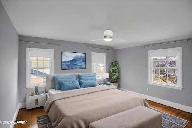 bedroom featuring hardwood / wood-style floors and ceiling fan