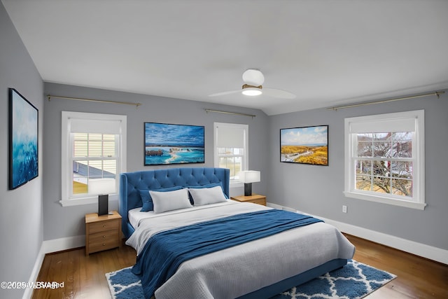 bedroom featuring hardwood / wood-style flooring and ceiling fan