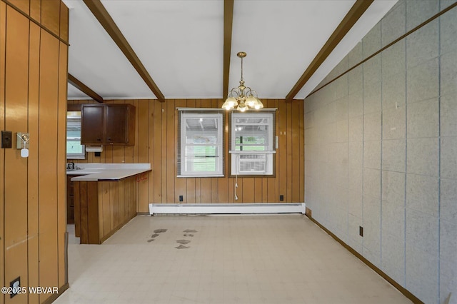345 E Main St, Loganton, PA 17747 - unfurnished dining area featuring beamed ceiling, wood walls, a notable chandelier, and a baseboard heating unit