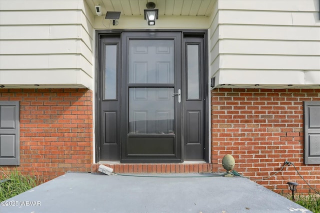 345 E Main St, Loganton, PA 17747 - view of exterior entry featuring brick siding