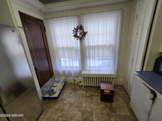 dining space featuring radiator