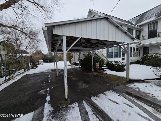 exterior space featuring a carport