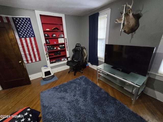 living room with dark hardwood / wood-style floors