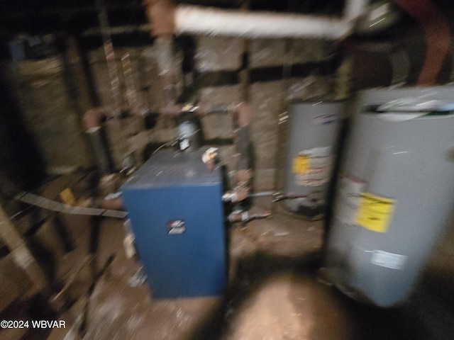 utility room with gas water heater