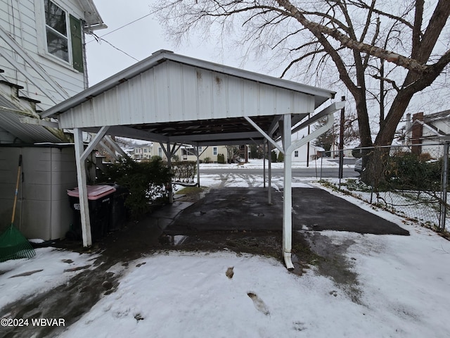 exterior space with a carport