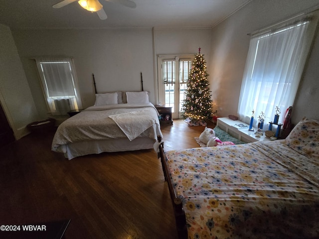 bedroom featuring ceiling fan and wood-type flooring