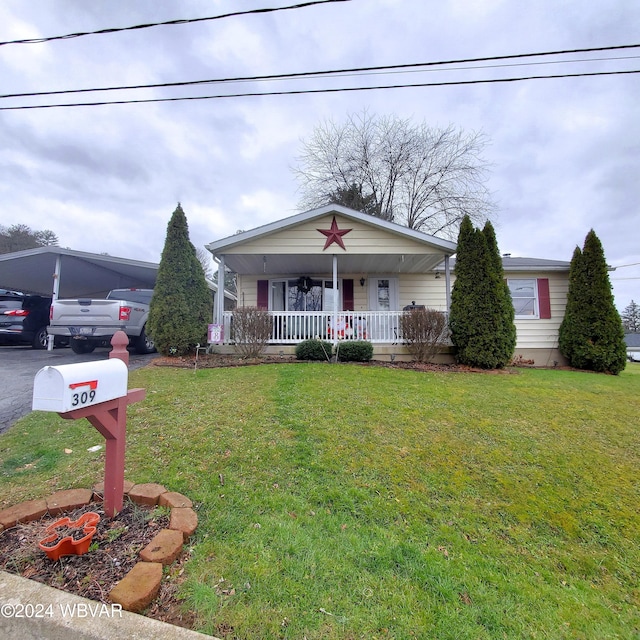 view of front of home with covered porch and a front lawn