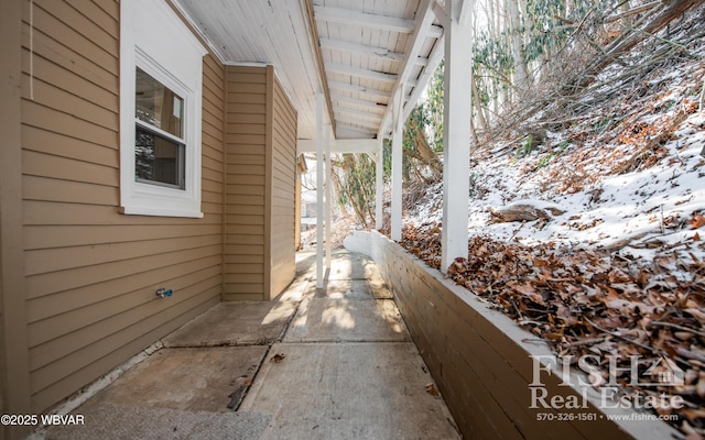 view of snow covered patio