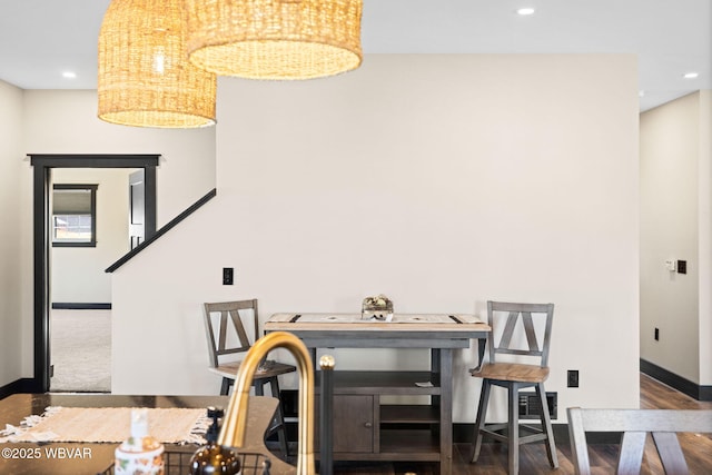 dining room featuring recessed lighting, visible vents, baseboards, and wood finished floors