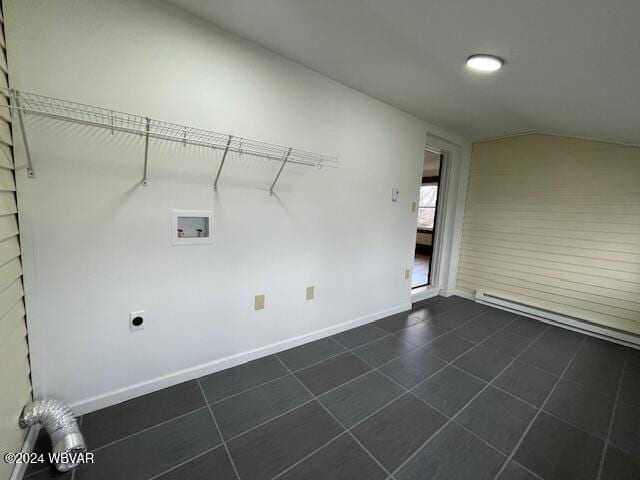 laundry room featuring hookup for an electric dryer, washer hookup, a baseboard radiator, and dark tile patterned floors