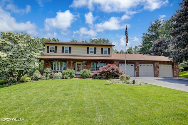 43 Hillcrest Ln, Williamsport, PA 17701 - view of front facade with a front lawn, driveway, a garage, and brick siding