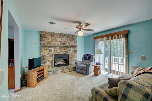 43 Hillcrest Ln, Williamsport, PA 17701 - living room featuring carpet, a ceiling fan, and a fireplace