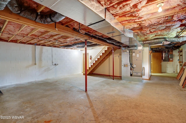 43 Hillcrest Ln, Williamsport, PA 17701 - unfinished below grade area with stairway, heating unit, and concrete block wall