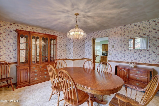 43 Hillcrest Ln, Williamsport, PA 17701 - dining room with a chandelier, a wainscoted wall, wallpapered walls, and light colored carpet
