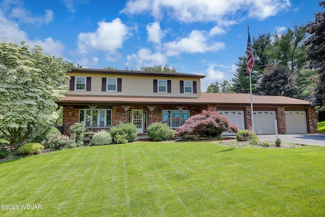 43 Hillcrest Ln, Williamsport, PA 17701 - view of front of home featuring driveway, a front lawn, an attached garage, a porch, and brick siding