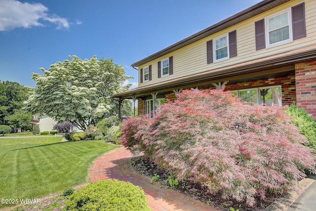 43 Hillcrest Ln, Williamsport, PA 17701 - view of front of home featuring a front yard and brick siding