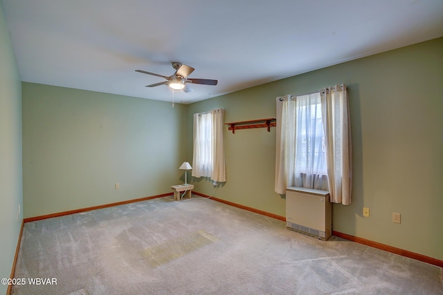 43 Hillcrest Ln, Williamsport, PA 17701 - carpeted empty room with plenty of natural light and a ceiling fan