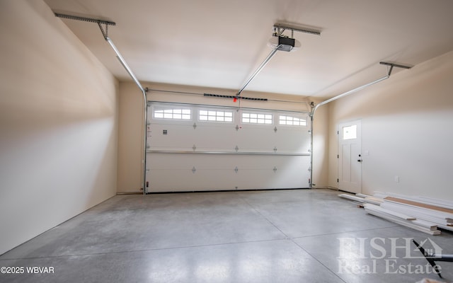 garage featuring a garage door opener