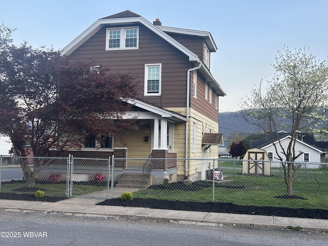 2401 Linn St, Williamsport, PA 17701 - view of front of home featuring a fenced front yard, a gate, covered porch, and a front yard
