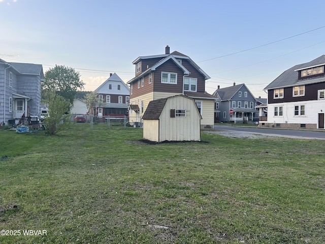 2401 Linn St, Williamsport, PA 17701 - view of yard with an outbuilding, a storage shed, and fence