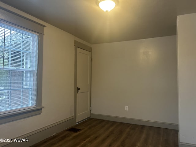 2401 Linn St, Williamsport, PA 17701 - unfurnished room with a wealth of natural light, dark wood finished floors, and visible vents