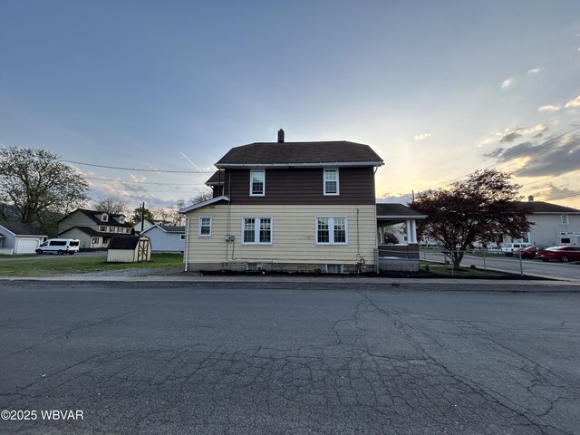 2401 Linn St, Williamsport, PA 17701 - view of front of house with an outbuilding and a storage shed