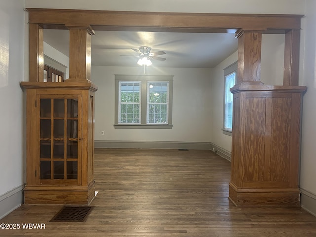 2401 Linn St, Williamsport, PA 17701 - unfurnished living room with ceiling fan, baseboards, visible vents, and wood finished floors