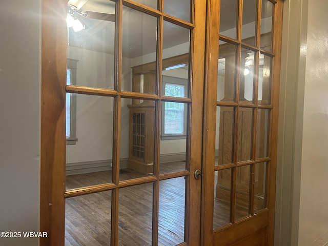 2401 Linn St, Williamsport, PA 17701 - interior details featuring french doors, wood finished floors, and baseboards