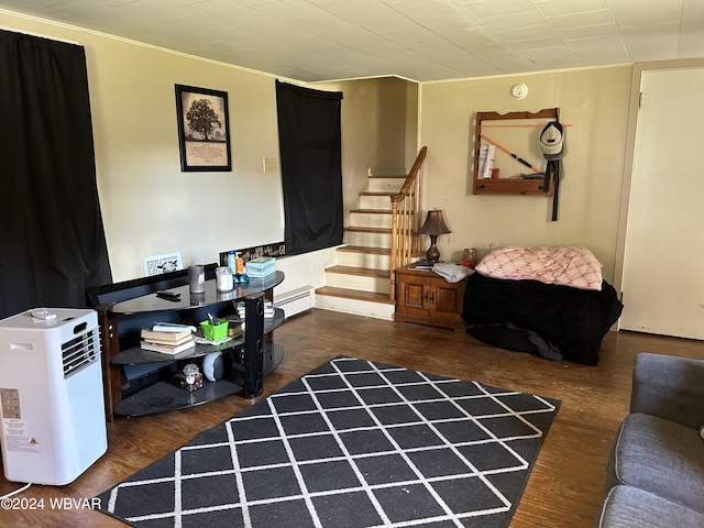 interior space with dark hardwood / wood-style flooring and a baseboard radiator