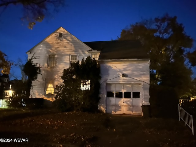 view of front of house featuring an outbuilding and a garage