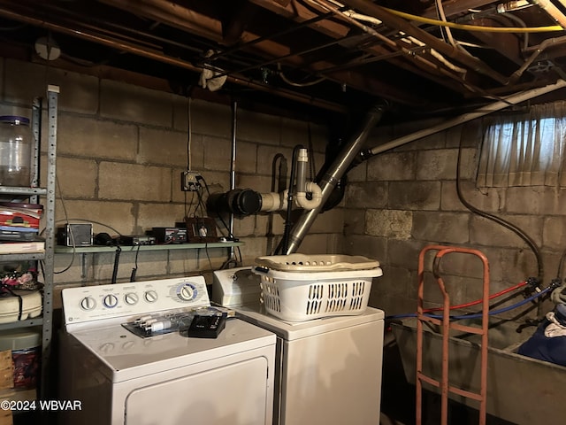 laundry area with washer and dryer