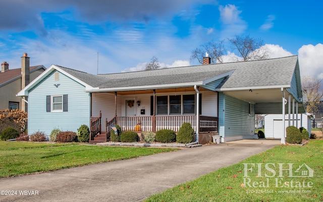 ranch-style home with a front yard, a porch, and a carport