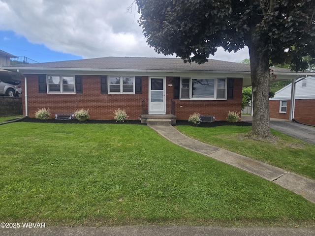 1760 Fredna Ave, Williamsport, PA 17701 - view of front of house with brick siding and a front lawn